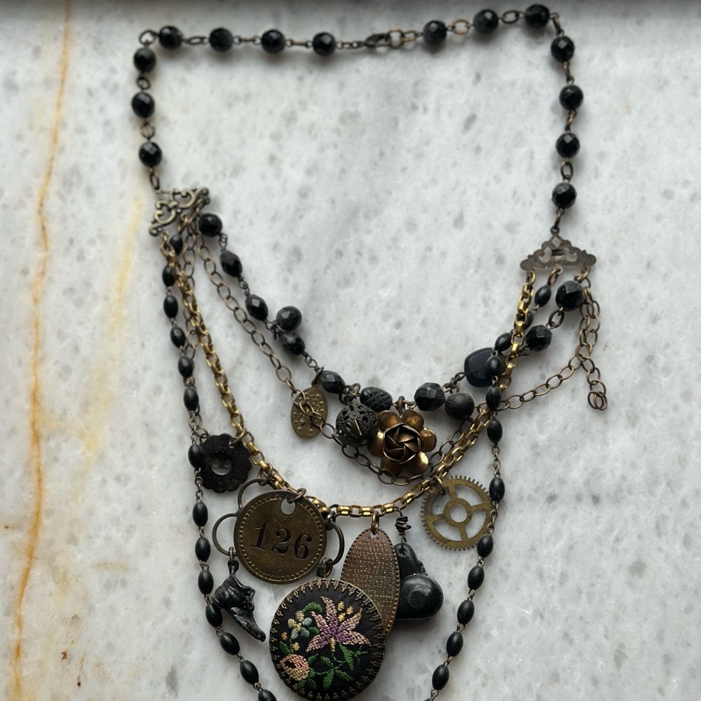 Elegant Black and Gold Multi-Layered Necklace
